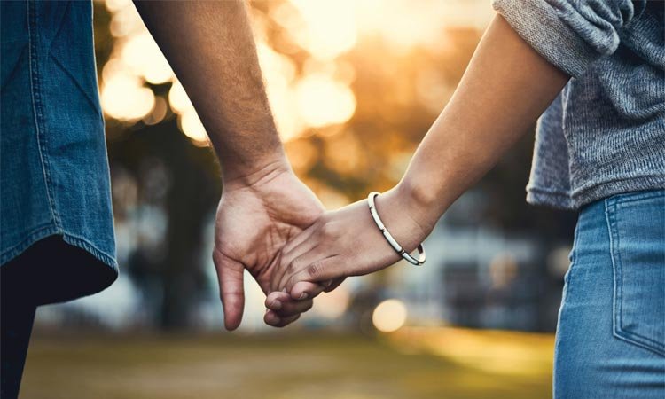 Hand in hand, connected to love